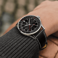 navitimer-41-gmt-a32310251b1p1-black-leather-wrist-shot-ecom.png